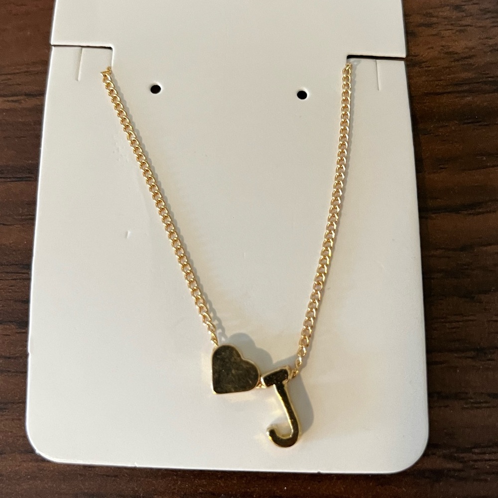 Golden J necklace with heart